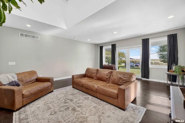 a bathroom with a sink vanity and mirror