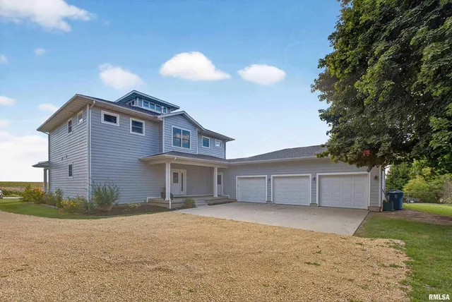 a view of a big yard with large trees