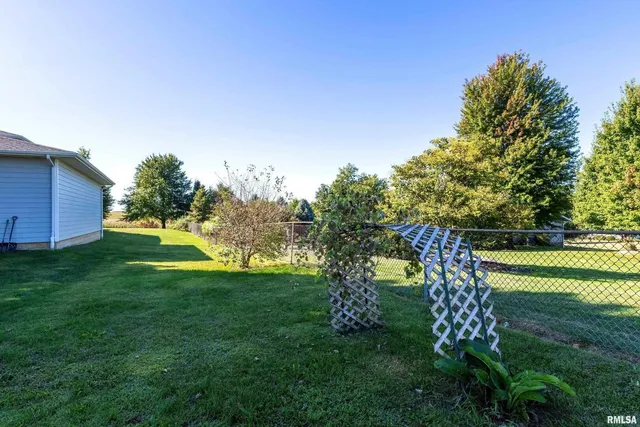 a bathroom with a toilet a sink a vanity and mirror