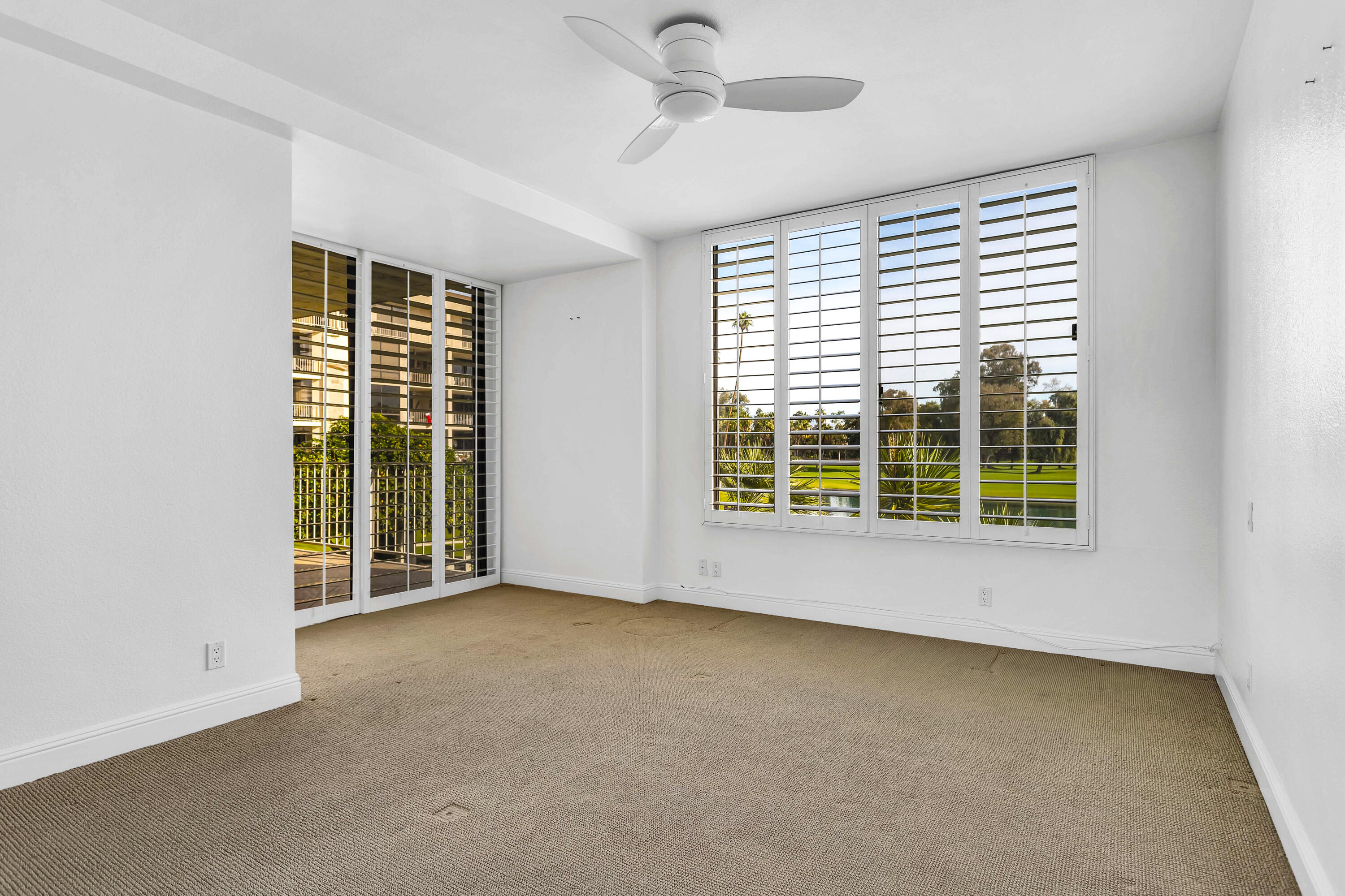 910 Island Drive, Unit 211 Rancho Mirage, CA 92270 - Photo 19 of 38 a view of an empty room with a window