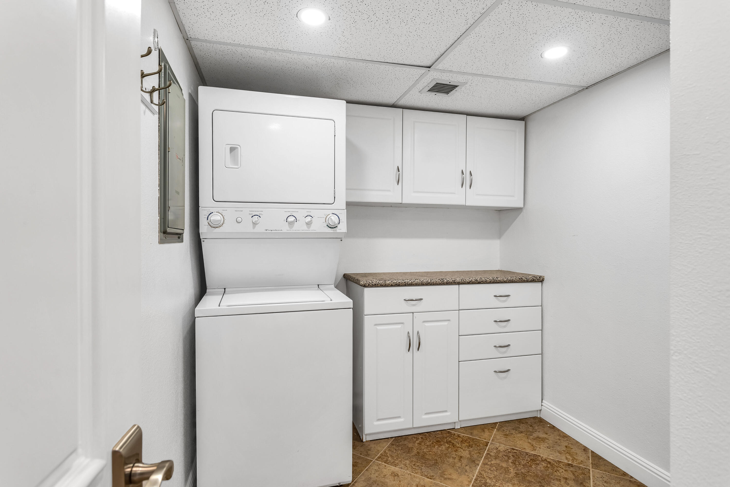 910 Island Drive, Unit 211 Rancho Mirage, CA 92270 - Photo 27 of 38 a view of storage and utility room with washer and dryer