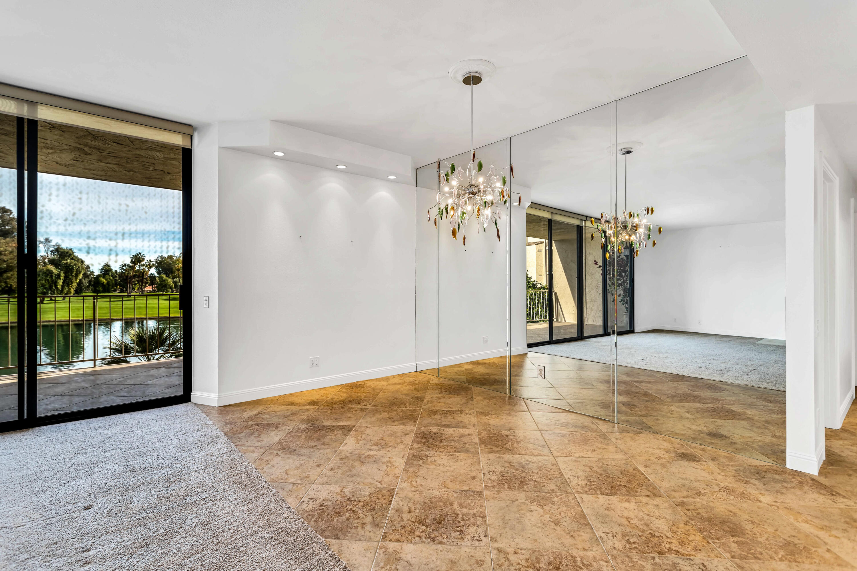 910 Island Drive, Unit 211 Rancho Mirage, CA 92270 - Photo 6 of 38 a view of a kitchen with a natural light