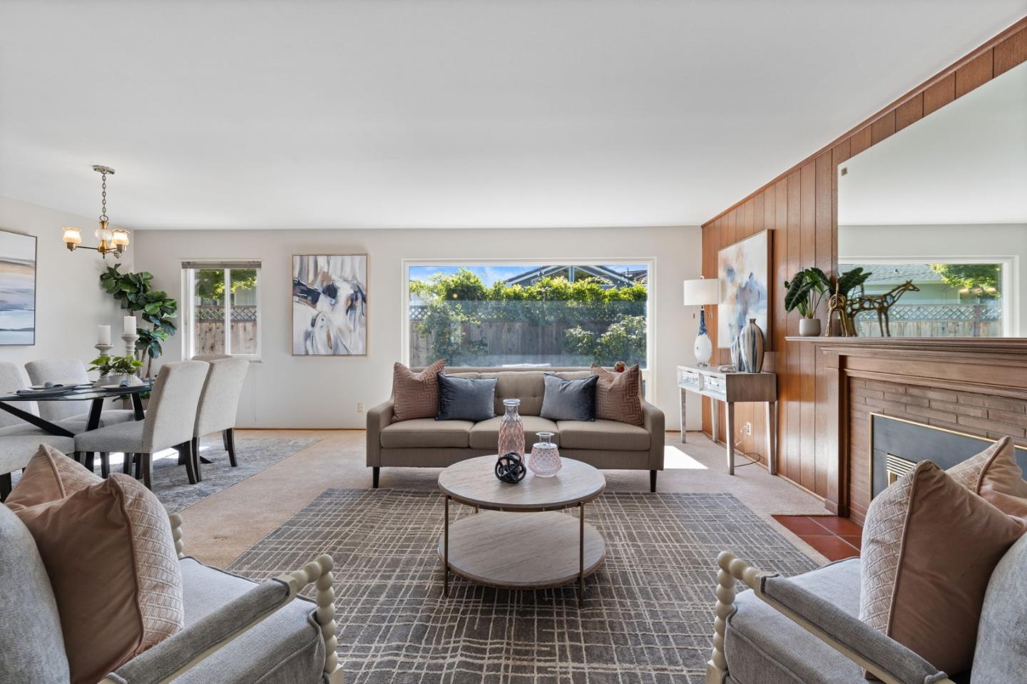 228 Spuraway Drive San Mateo, CA 94403 - Photo 6 of 20 a living room with furniture and a fireplace