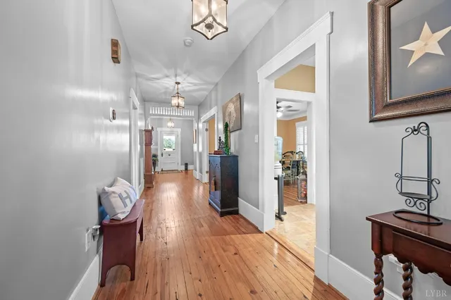 a view of a livingroom with furniture and staircase