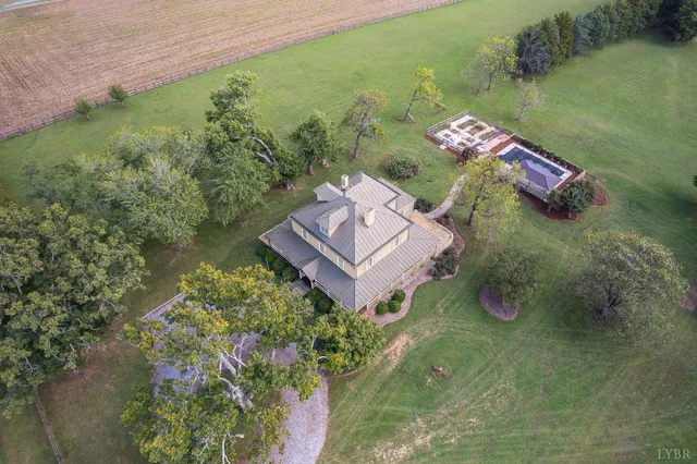 a view of an entryway with wooden floor and door