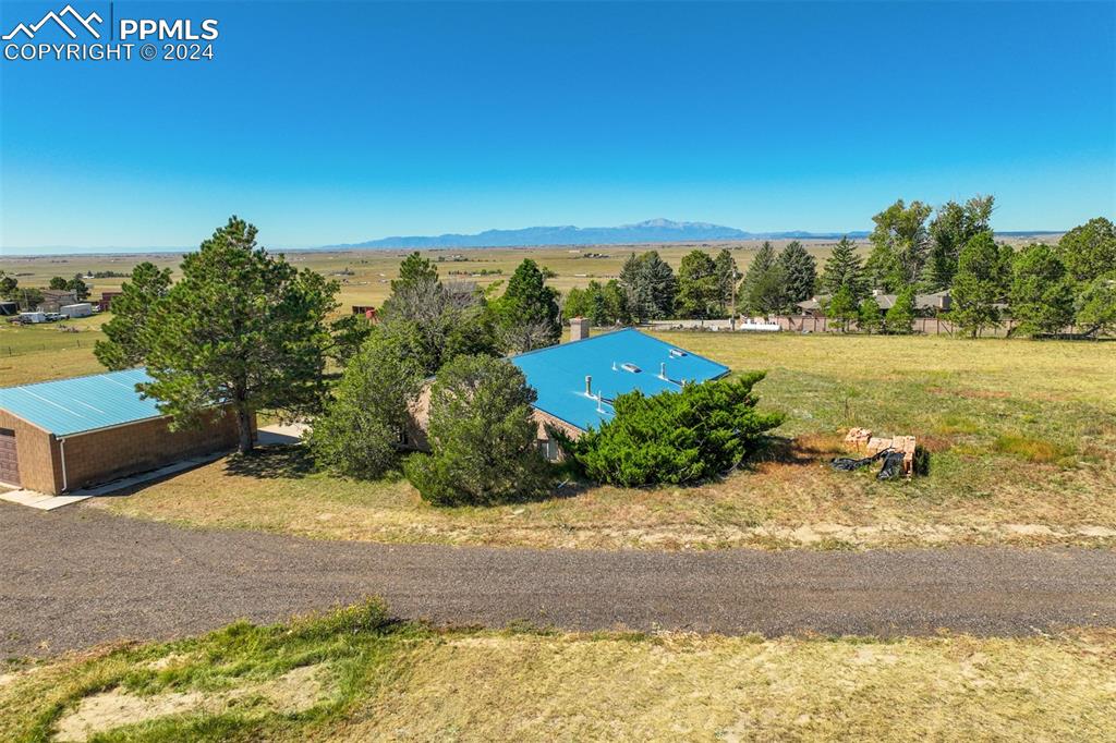 23555 Murphy Road Calhan, CO 80808 - Photo 7 of 49 View of water feature featuring a mountain view and a rural view