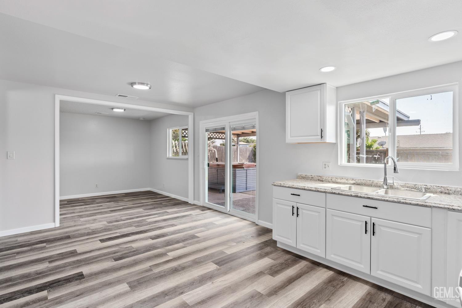 Undisclosed Address Santa Maria, CA 93455 - Photo 16 of 34 a spacious bathroom with a granite countertop sink mirror and