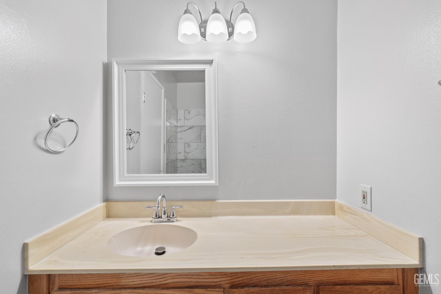 Undisclosed Address Santa Maria, CA 93455 - Photo 19 of 34 a bathroom with a sink and a mirror