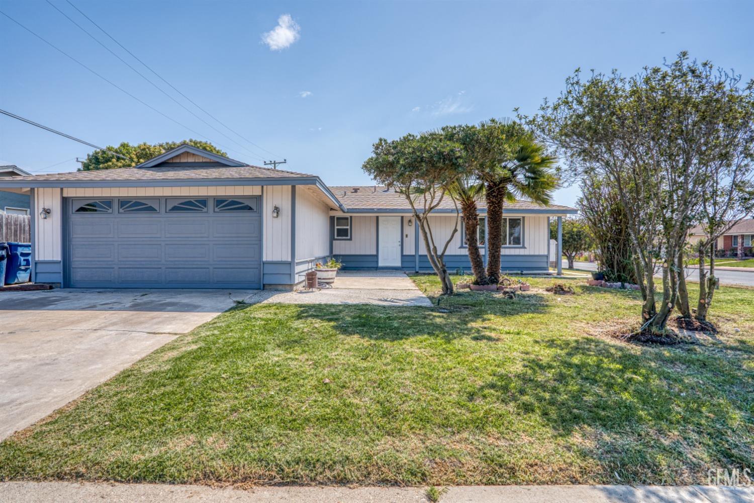 Undisclosed Address Santa Maria, CA 93455 - Photo 2 of 34 a front view of a house with a yard