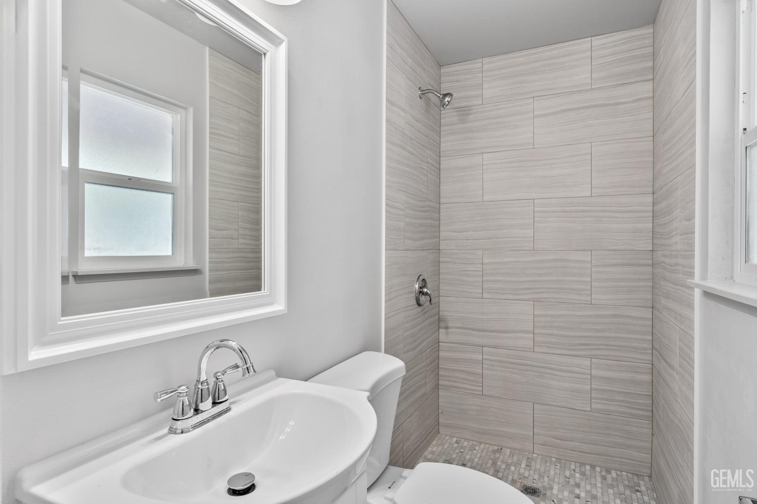 Undisclosed Address Santa Maria, CA 93455 - Photo 23 of 34 a bathroom with a sink a toilet and shower