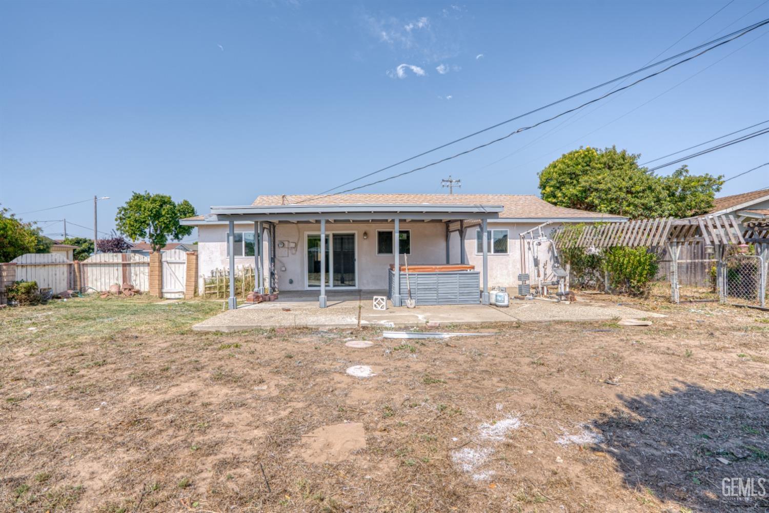 Undisclosed Address Santa Maria, CA 93455 - Photo 27 of 34 a front view of a house with a garden