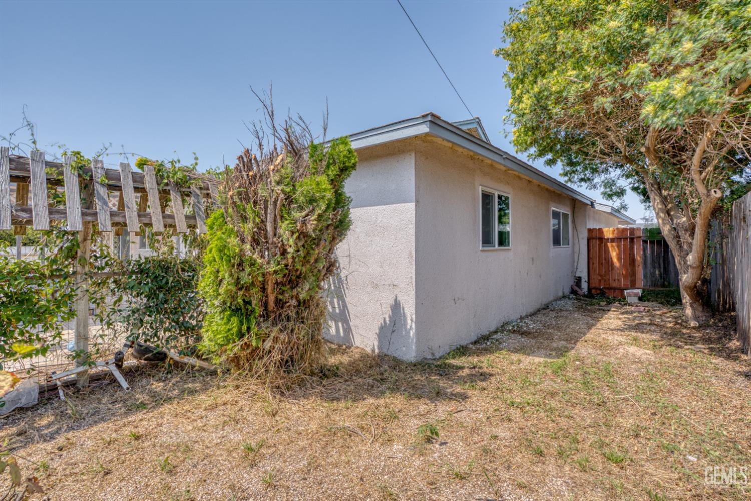 Undisclosed Address Santa Maria, CA 93455 - Photo 30 of 34 a view of a house with a yard and tree