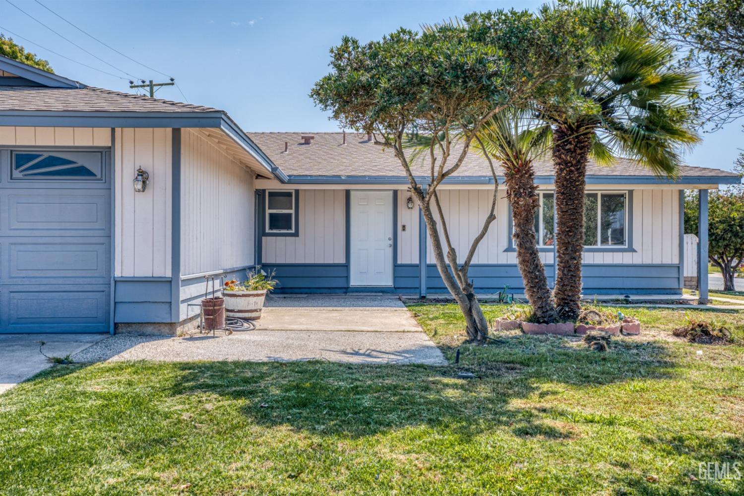 Undisclosed Address Santa Maria, CA 93455 - Photo 3 of 34 a view of a house with backyard and a tree