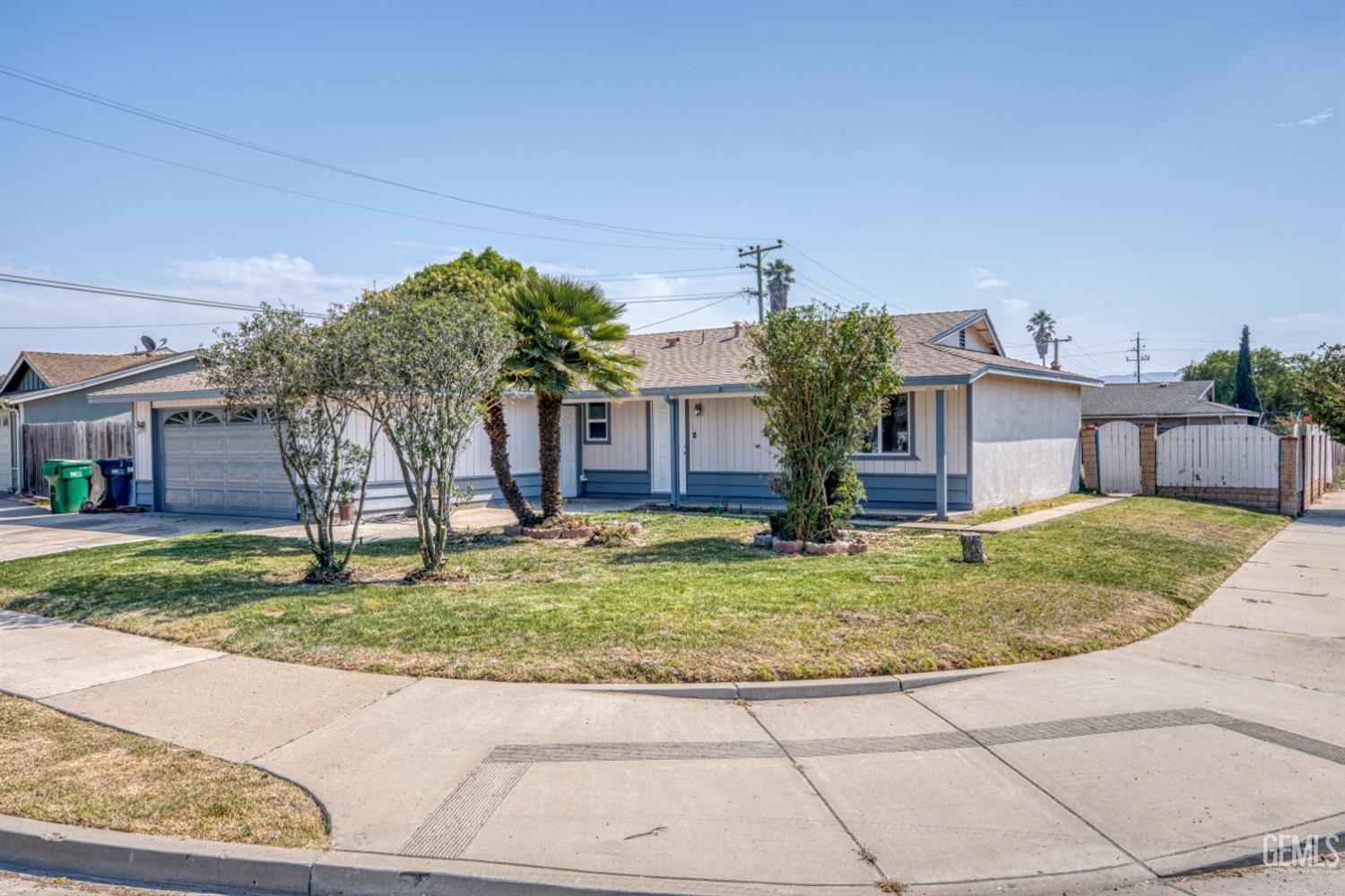Undisclosed Address Santa Maria, CA 93455 - Photo 5 of 34 a front view of a house with garden