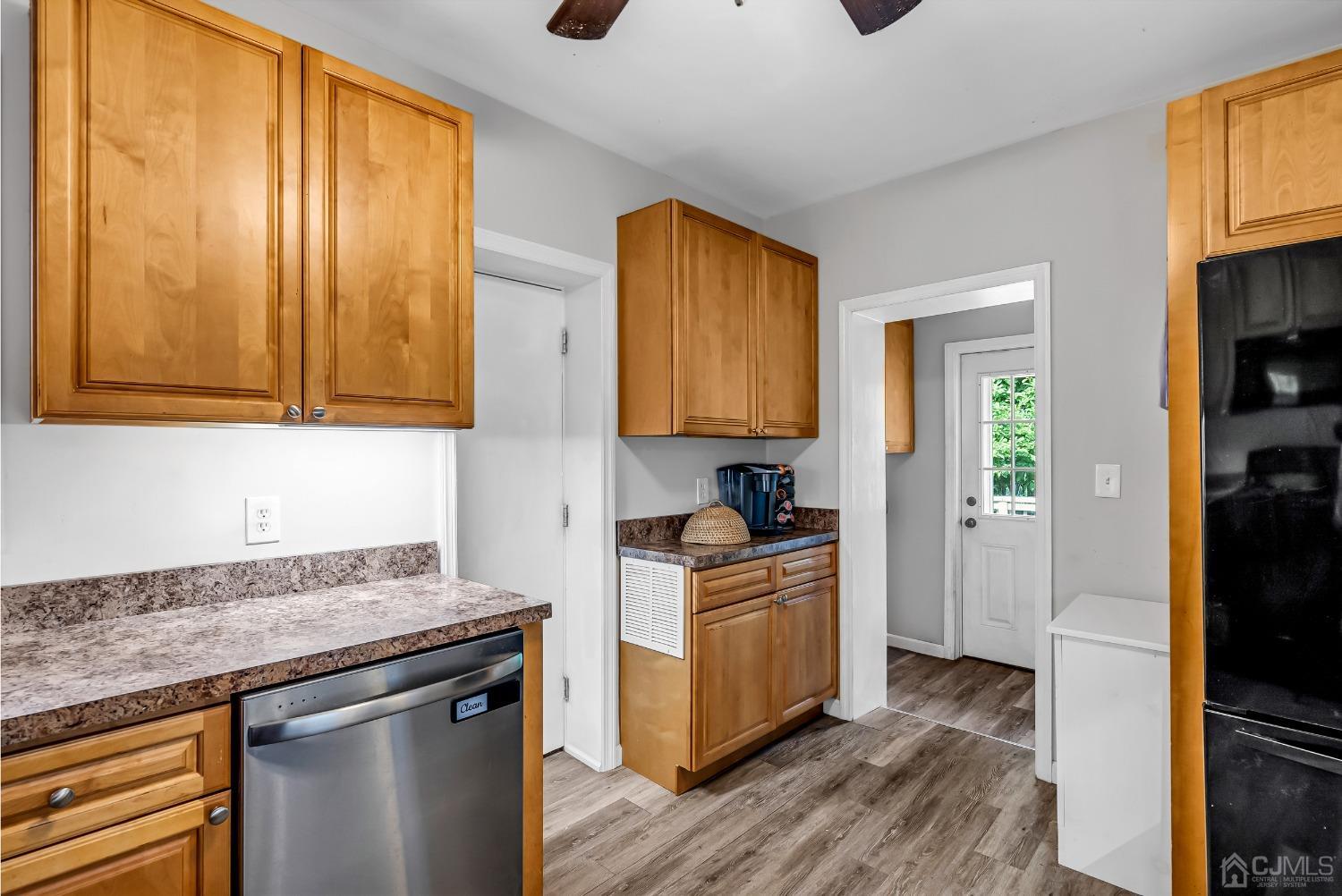 40 Farrington Road Old Bridge, NJ 07747 - Photo 13 of 49 a kitchen with stainless steel appliances granite countertop a stove and a refrigerator