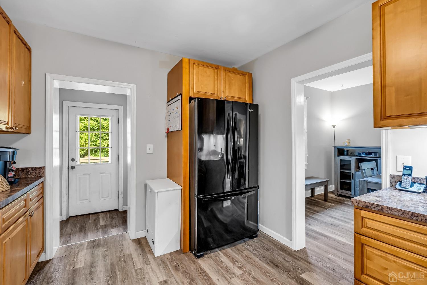40 Farrington Road Old Bridge, NJ 07747 - Photo 14 of 49 a view of a kitchen from the hallway