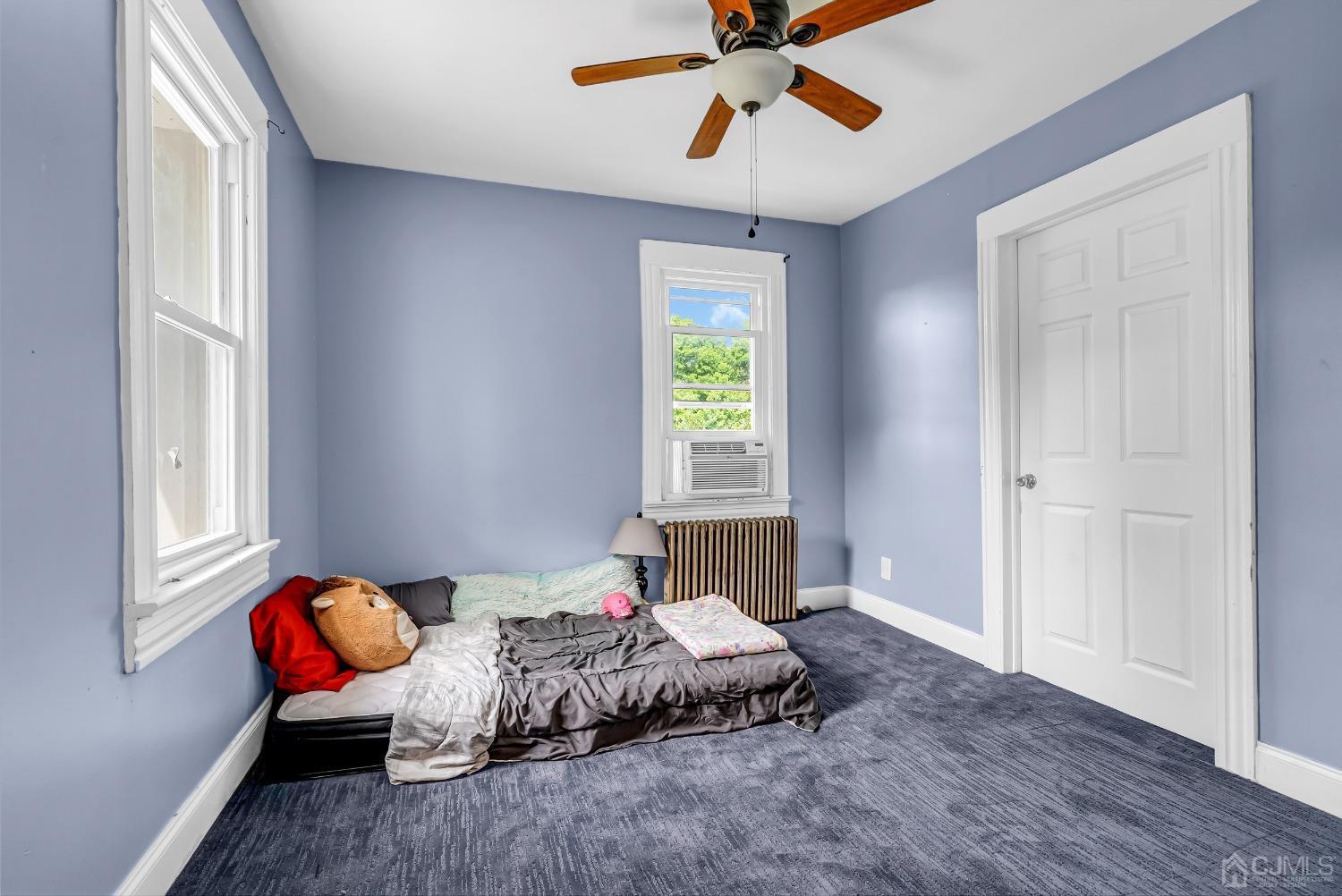40 Farrington Road Old Bridge, NJ 07747 - Photo 18 of 49 a bedroom with a bed and window