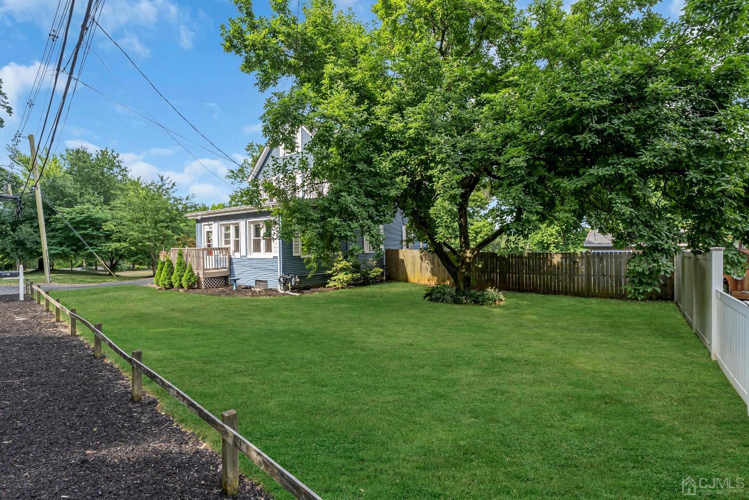 40 Farrington Road Old Bridge, NJ 07747 - Photo 31 of 49 a view of a house with a backyard