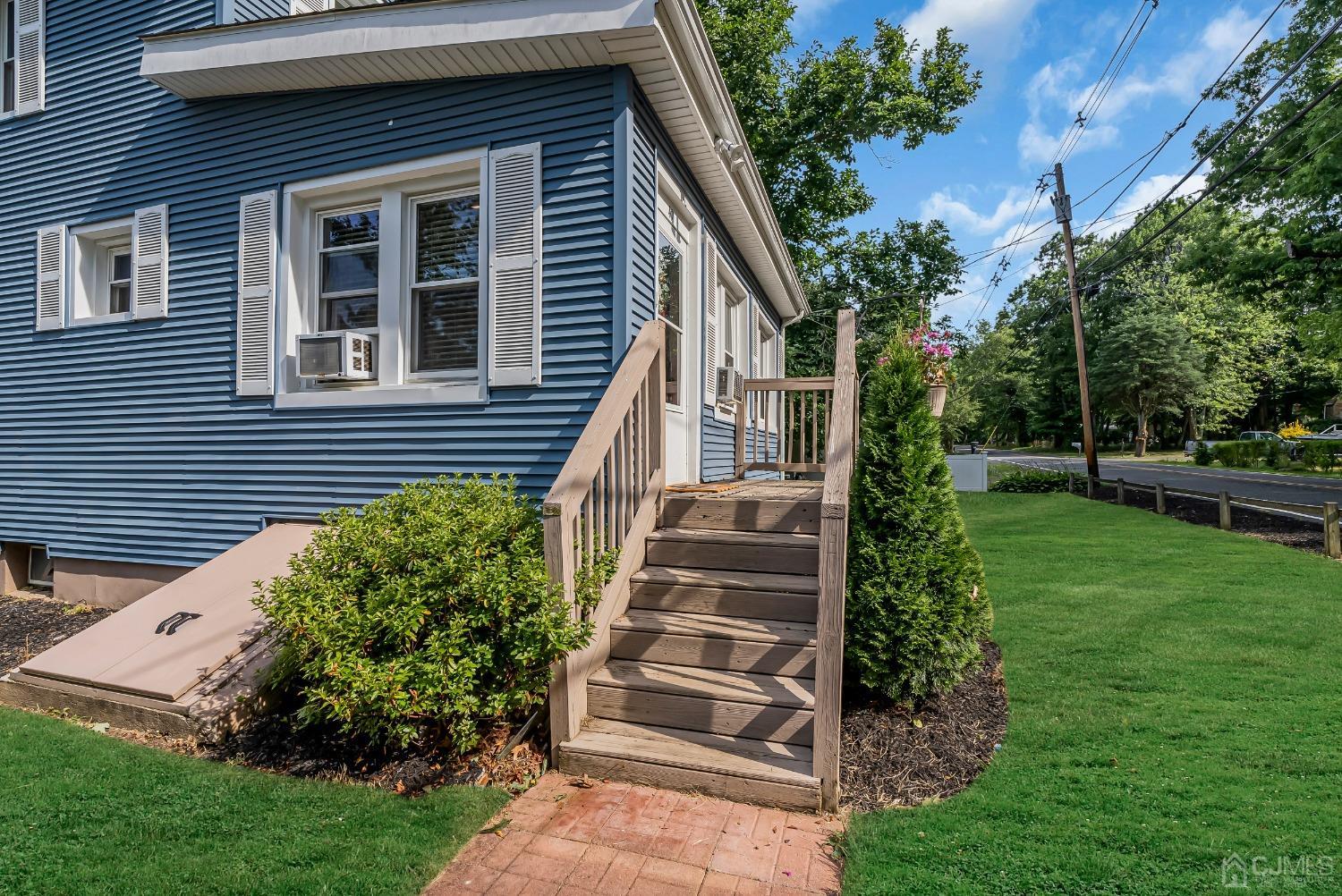 40 Farrington Road Old Bridge, NJ 07747 - Photo 33 of 49 a front view of a house with a yard