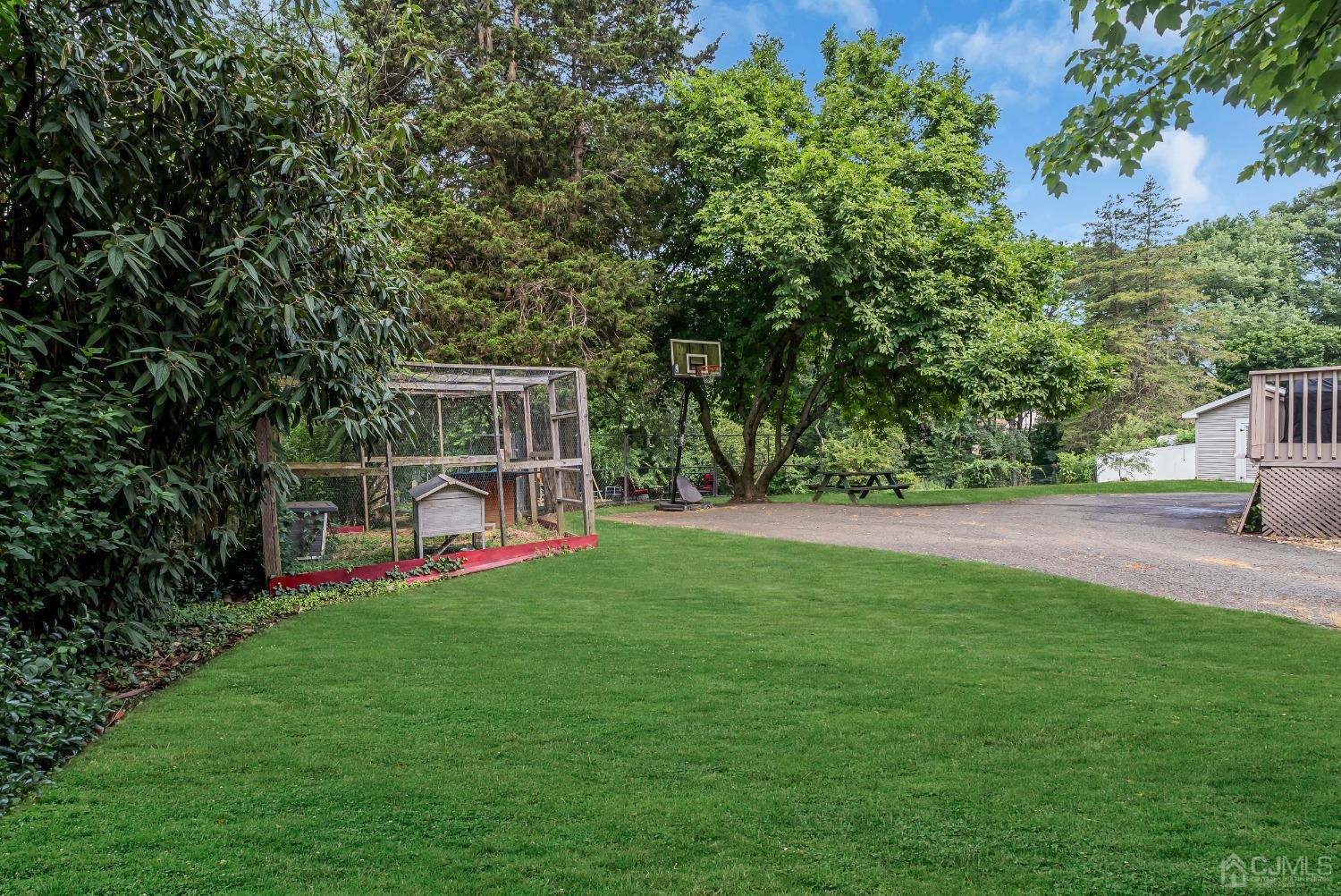40 Farrington Road Old Bridge, NJ 07747 - Photo 41 of 49 a view of a green field with sitting area