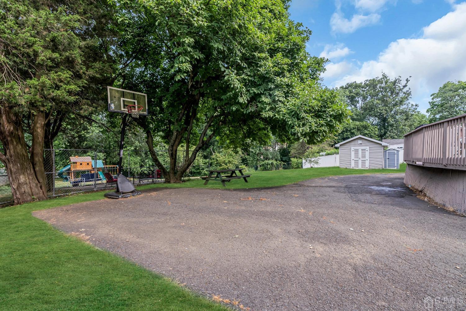40 Farrington Road Old Bridge, NJ 07747 - Photo 42 of 49 a view of a house with a yard and garage