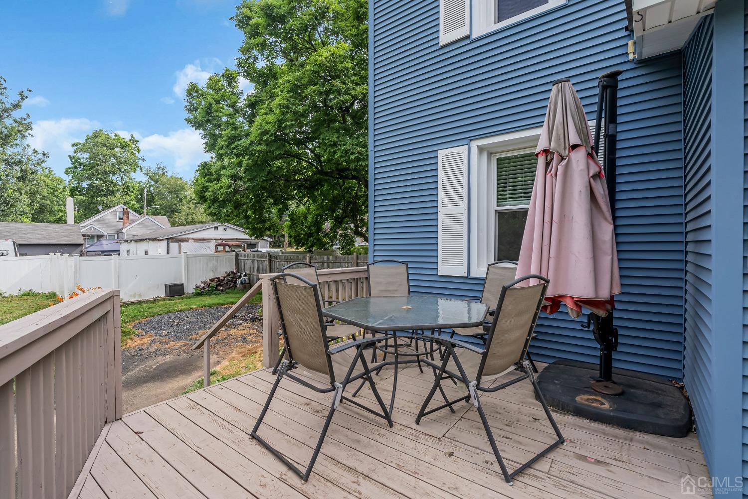 40 Farrington Road Old Bridge, NJ 07747 - Photo 49 of 49 a view of a wooden chairs on the deck