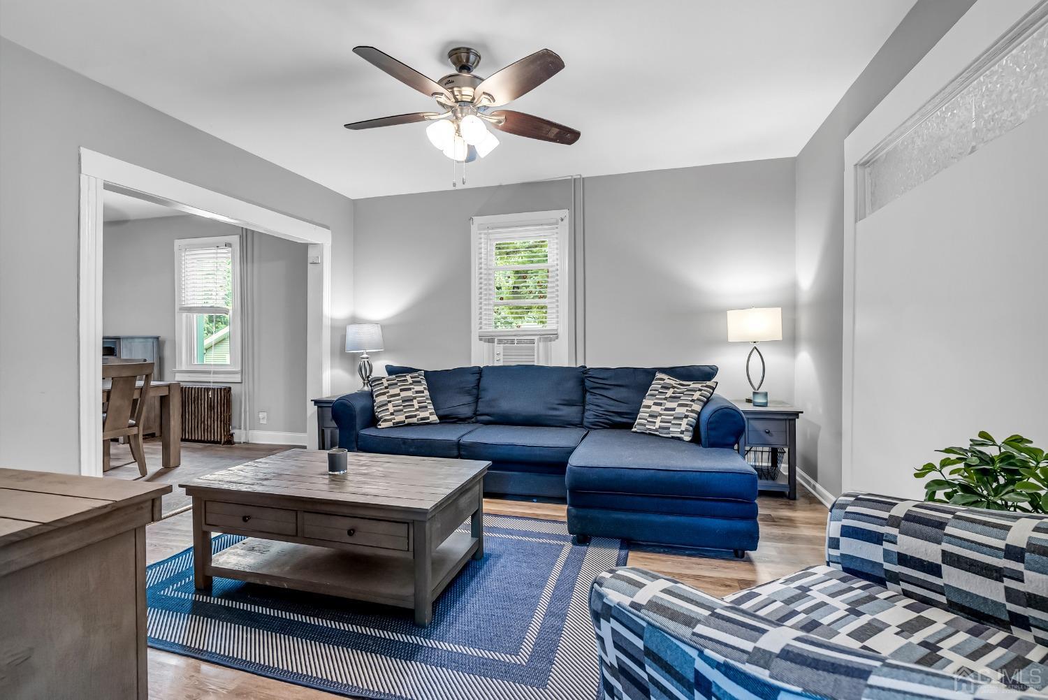 40 Farrington Road Old Bridge, NJ 07747 - Photo 7 of 49 a living room with furniture and wooden floor