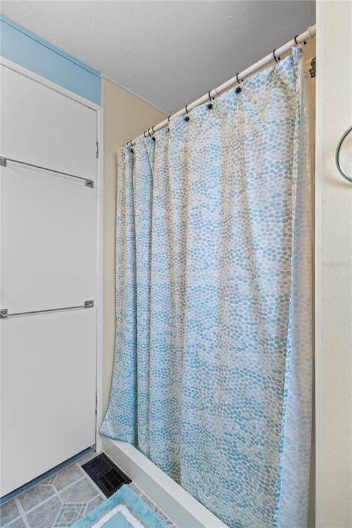 24437 Harbor View Road, Unit 55 Punta Gorda, FL 33980 - Photo 14 of 23 a bathroom with a shower and a sink