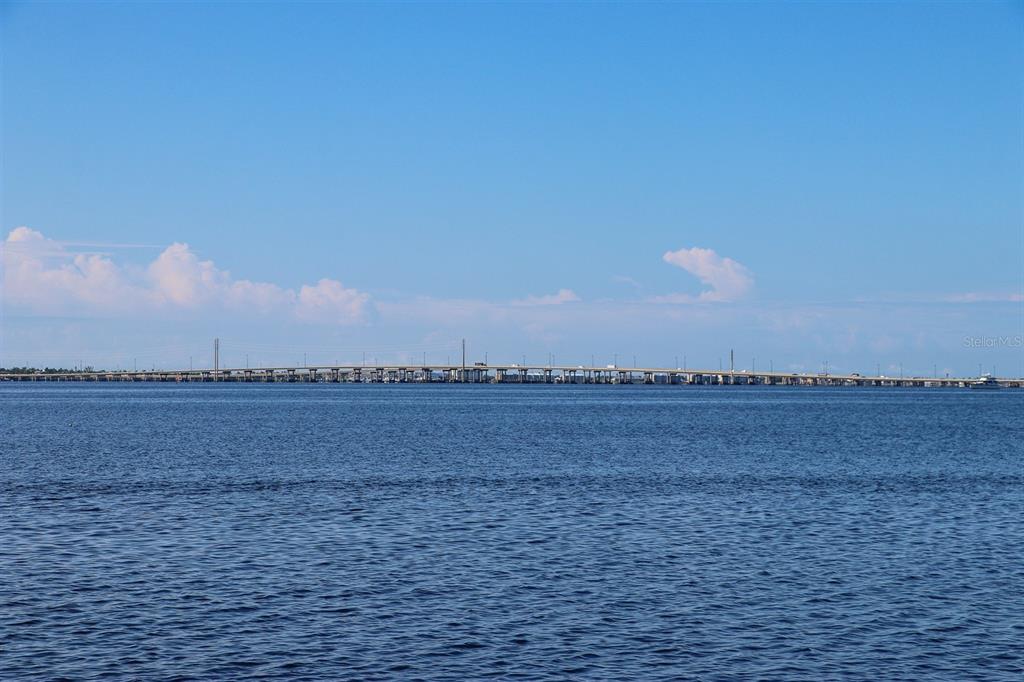 24437 Harbor View Road, Unit 55 Punta Gorda, FL 33980 - Photo 20 of 23 a view of an ocean and beach