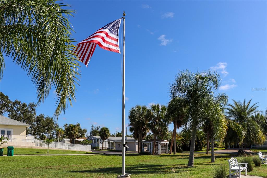 24437 Harbor View Road, Unit 55 Punta Gorda, FL 33980 - Photo 21 of 23 a view of a park with palm trees