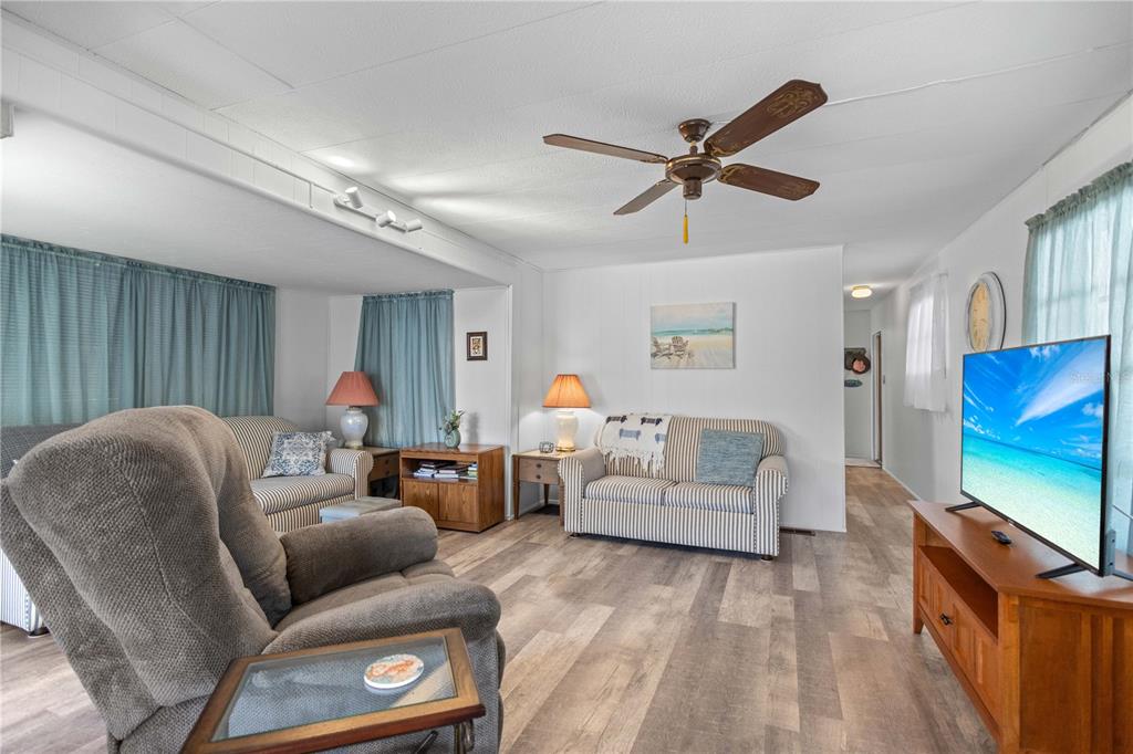 24437 Harbor View Road, Unit 55 Punta Gorda, FL 33980 - Photo 5 of 23 a living room with furniture