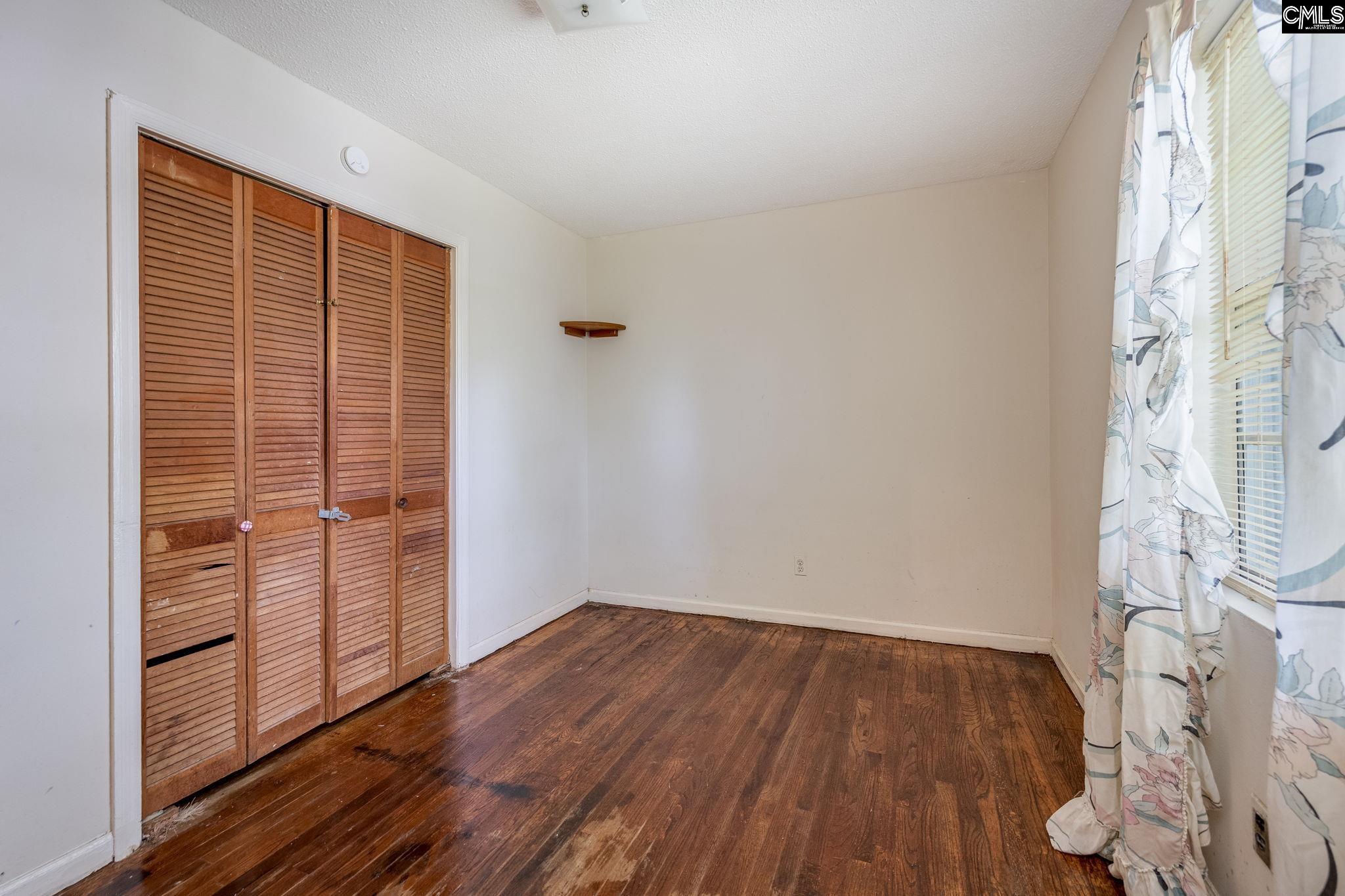 5666 Middleton Court Columbia, SC 29203 - Photo 32 of 42 wooden floor in an empty room