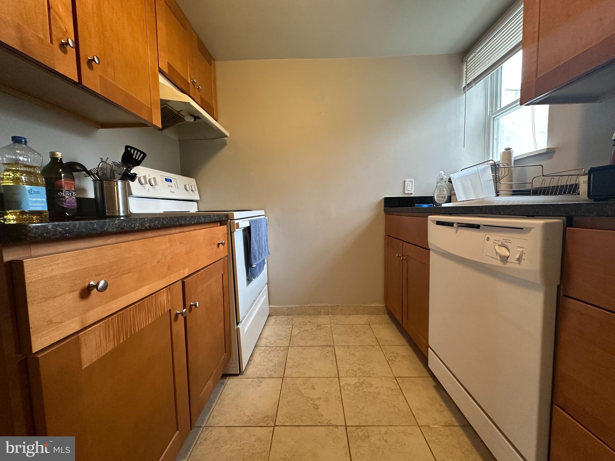 1608 South Street, Unit 3 Philadelphia, PA 19146 - Photo 5 of 10 a utility room with dryer and washer
