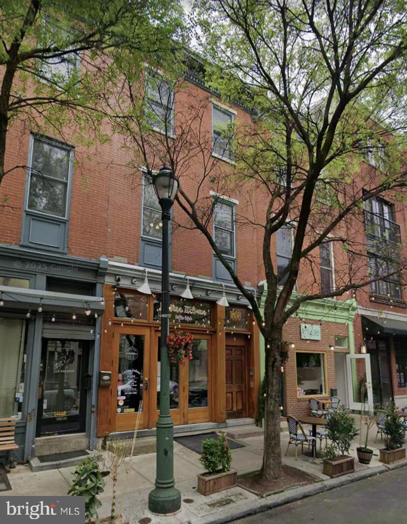 1608 South Street, Unit 3 Philadelphia, PA 19146 - Photo 10 of 10 a front view of a building with street view
