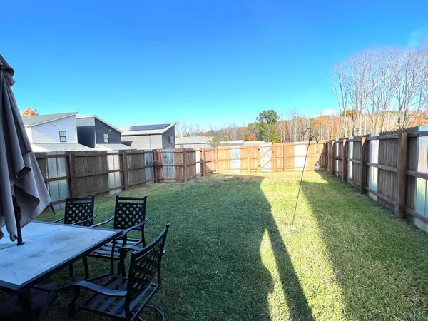 a utility room with sink dryer and washer