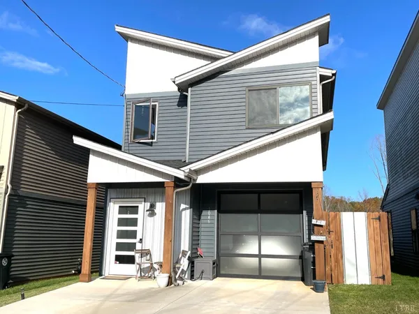 a view of a house with a garage