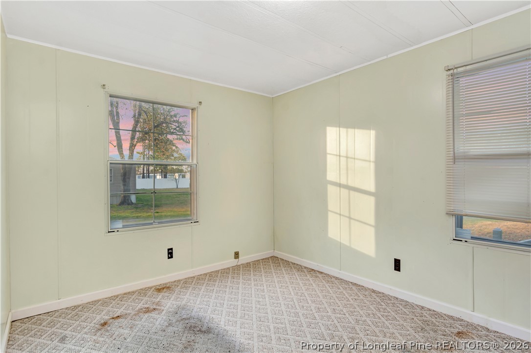 727 Rice Road Lumberton, NC 28358 - Photo 22 of 30 a view of an empty room with a window