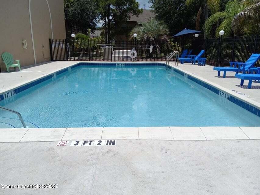 200 Spring Drive, Unit 1 Merritt Island, FL 32953 - Photo 14 of 15 Inviting, Sparkly Pool