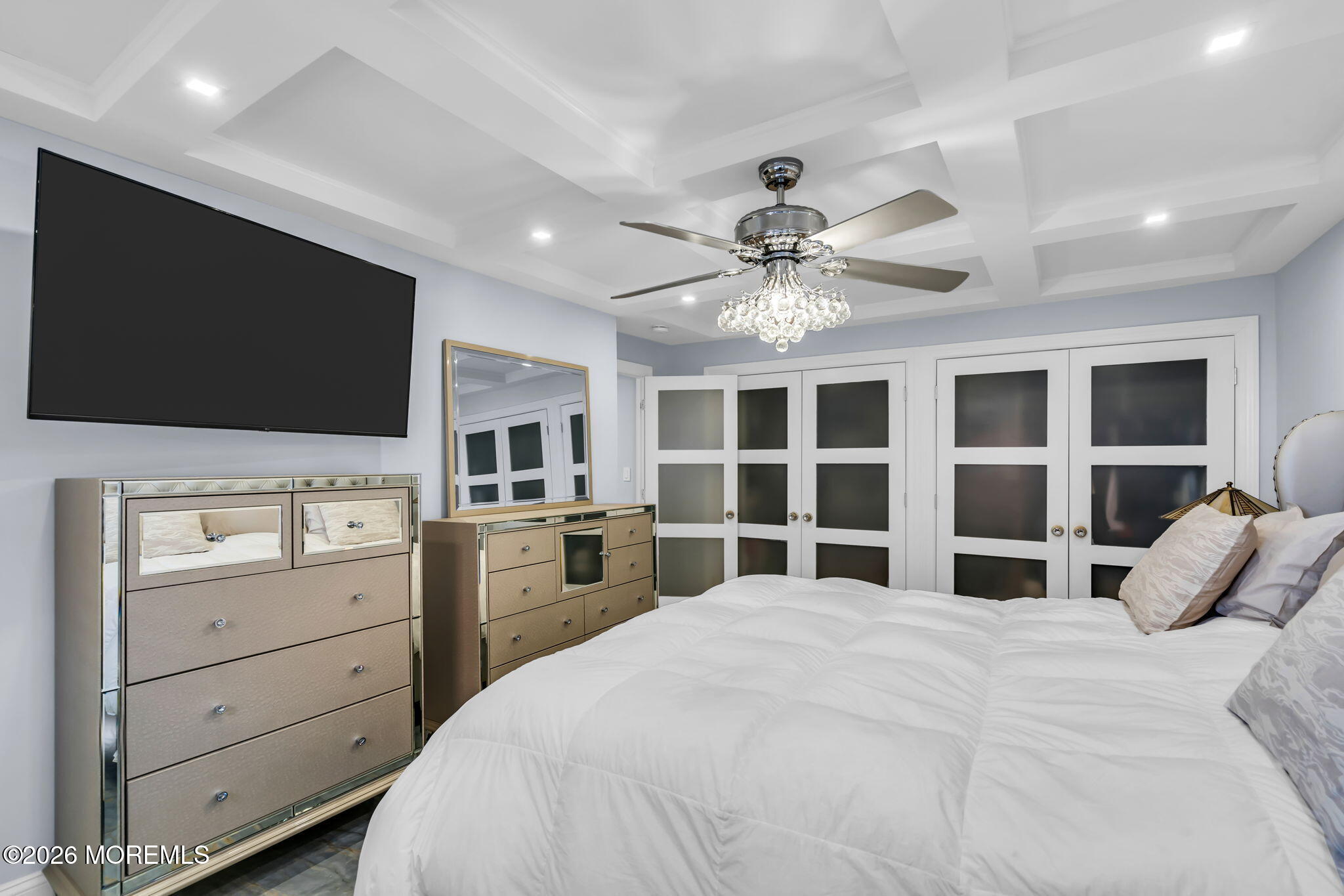 28 Riverside Avenue, Unit 1N Red Bank, NJ 07701 - Photo 1 of 40 a bedroom with a bed and a flat screen tv