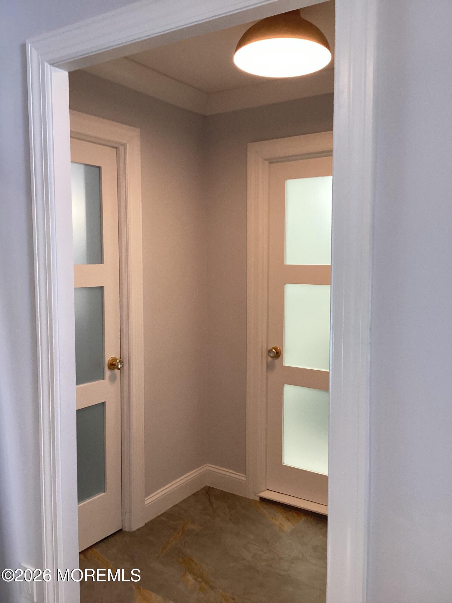 28 Riverside Avenue, Unit 1N Red Bank, NJ 07701 - Photo 25 of 40 a view of an empty room and window