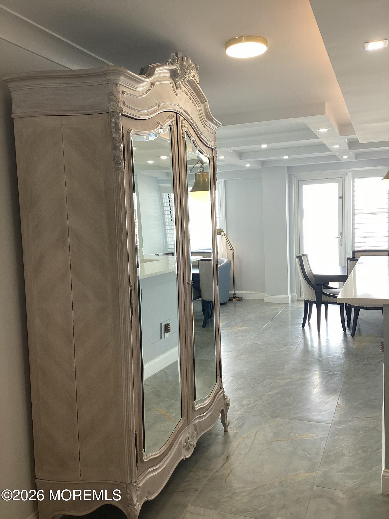 28 Riverside Avenue, Unit 1N Red Bank, NJ 07701 - Photo 27 of 40 a view of a hallway with dining area