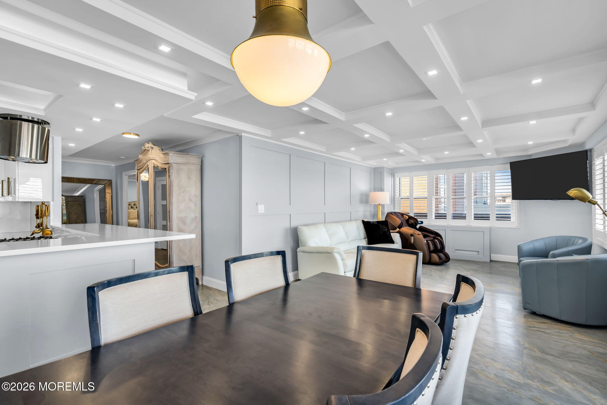 28 Riverside Avenue, Unit 1N Red Bank, NJ 07701 - Photo 6 of 40 a living room with furniture kitchen view and a large mirror