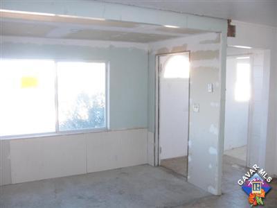 8433 Aspen Road Apple Valley, CA 92308 - Photo 5 of 5 a view of an empty room and a window