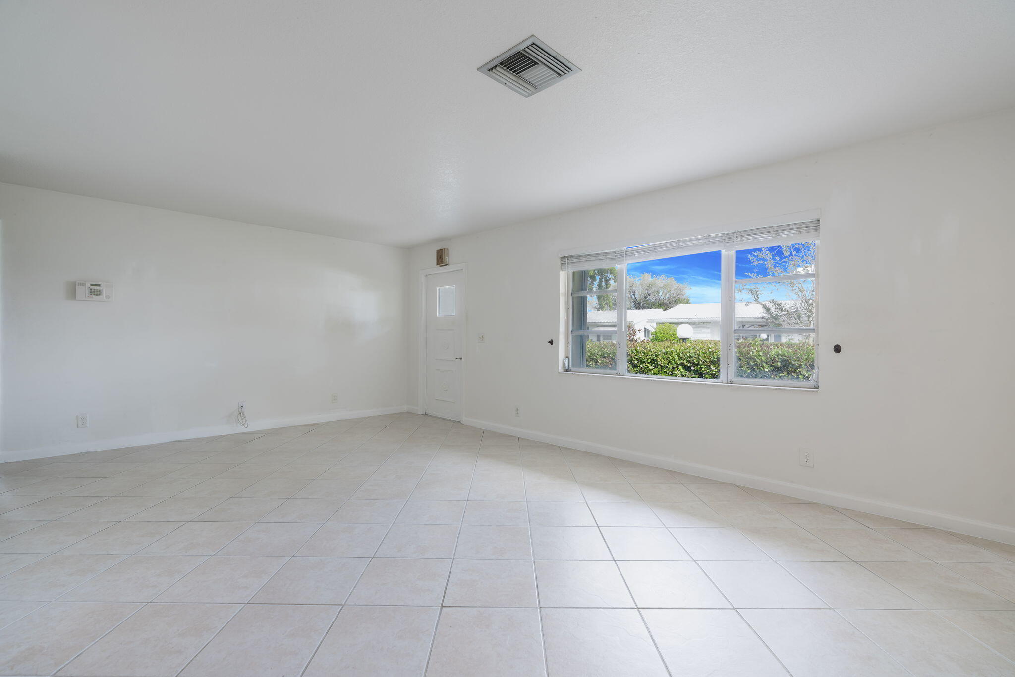 1141 Northwest 90th Way Plantation, FL 33322 - Photo 11 of 75 an empty room with windows