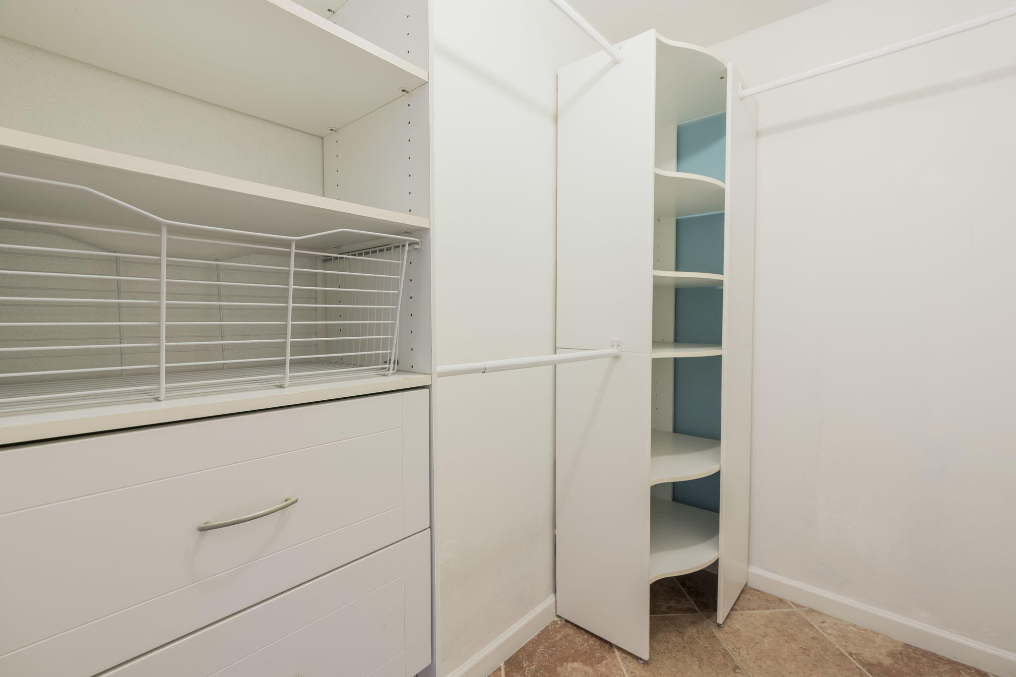1141 Northwest 90th Way Plantation, FL 33322 - Photo 25 of 75 a view of walk in closet with empty racks