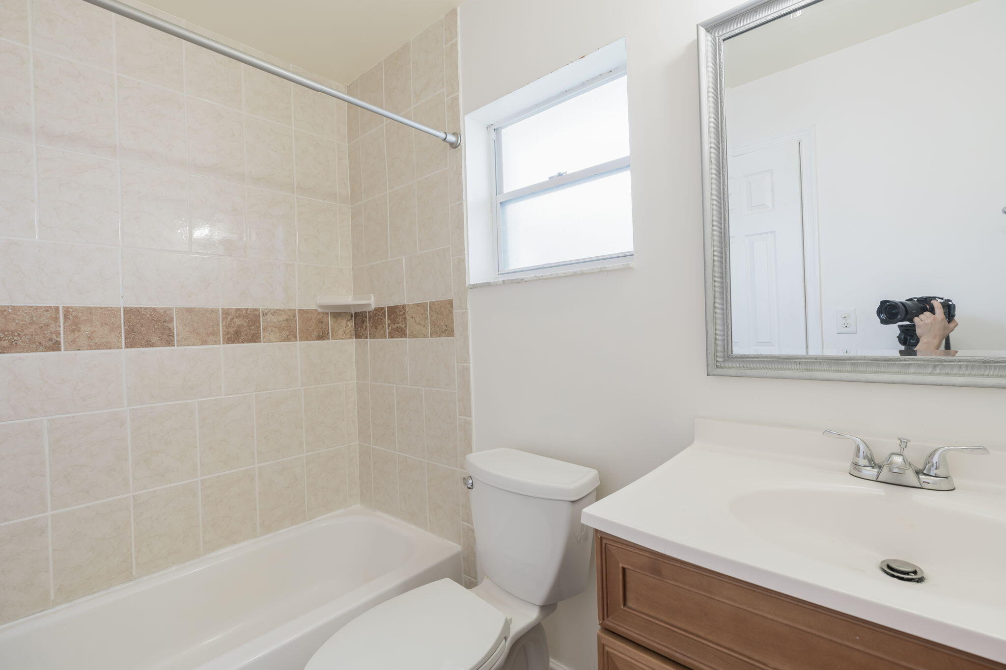 1141 Northwest 90th Way Plantation, FL 33322 - Photo 48 of 75 a bathroom with a sink a toilet and shower