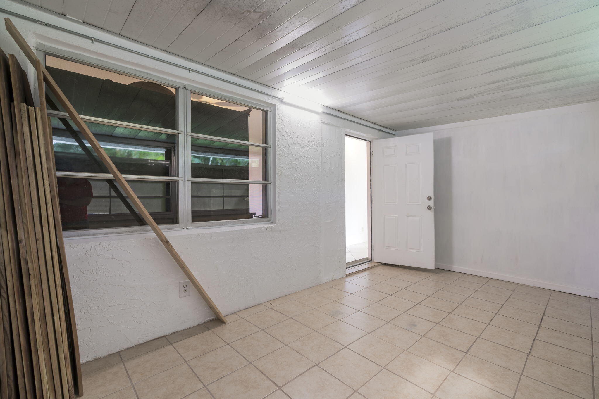 1141 Northwest 90th Way Plantation, FL 33322 - Photo 50 of 75 a view of an empty room with a window