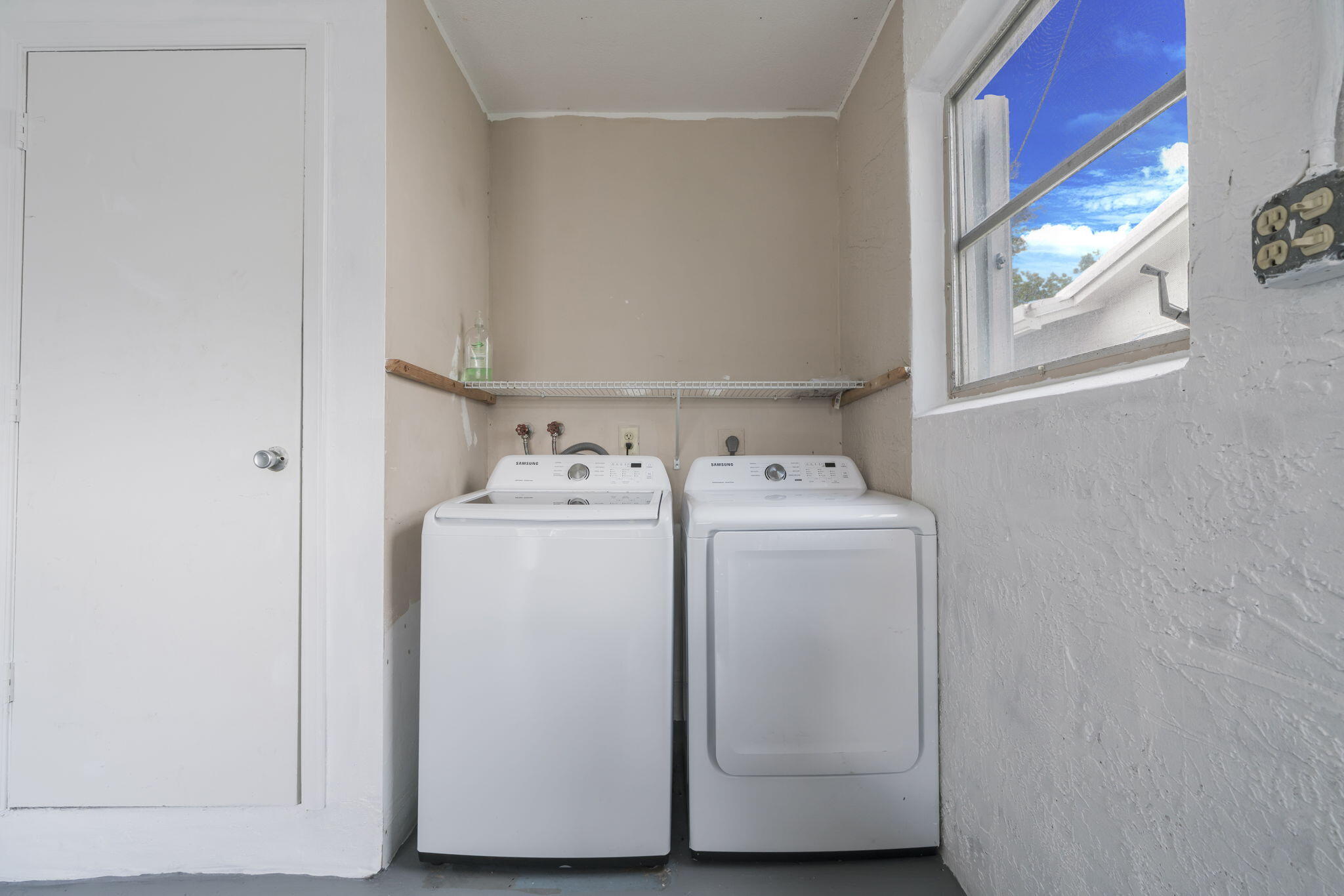 1141 Northwest 90th Way Plantation, FL 33322 - Photo 54 of 75 a utility room with dryer and washer