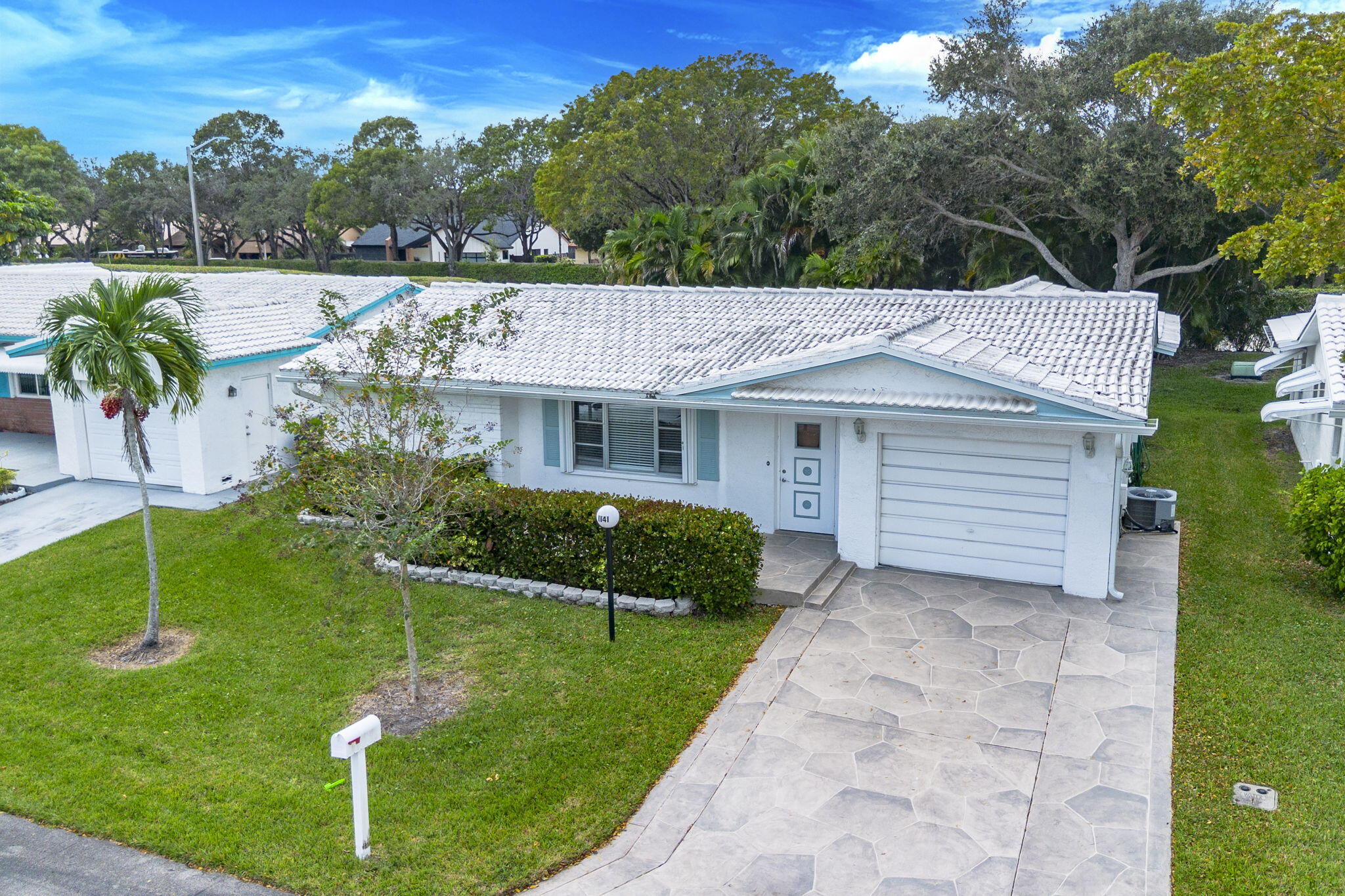 1141 Northwest 90th Way Plantation, FL 33322 - Photo 60 of 75 a view of a house with backyard and a garden