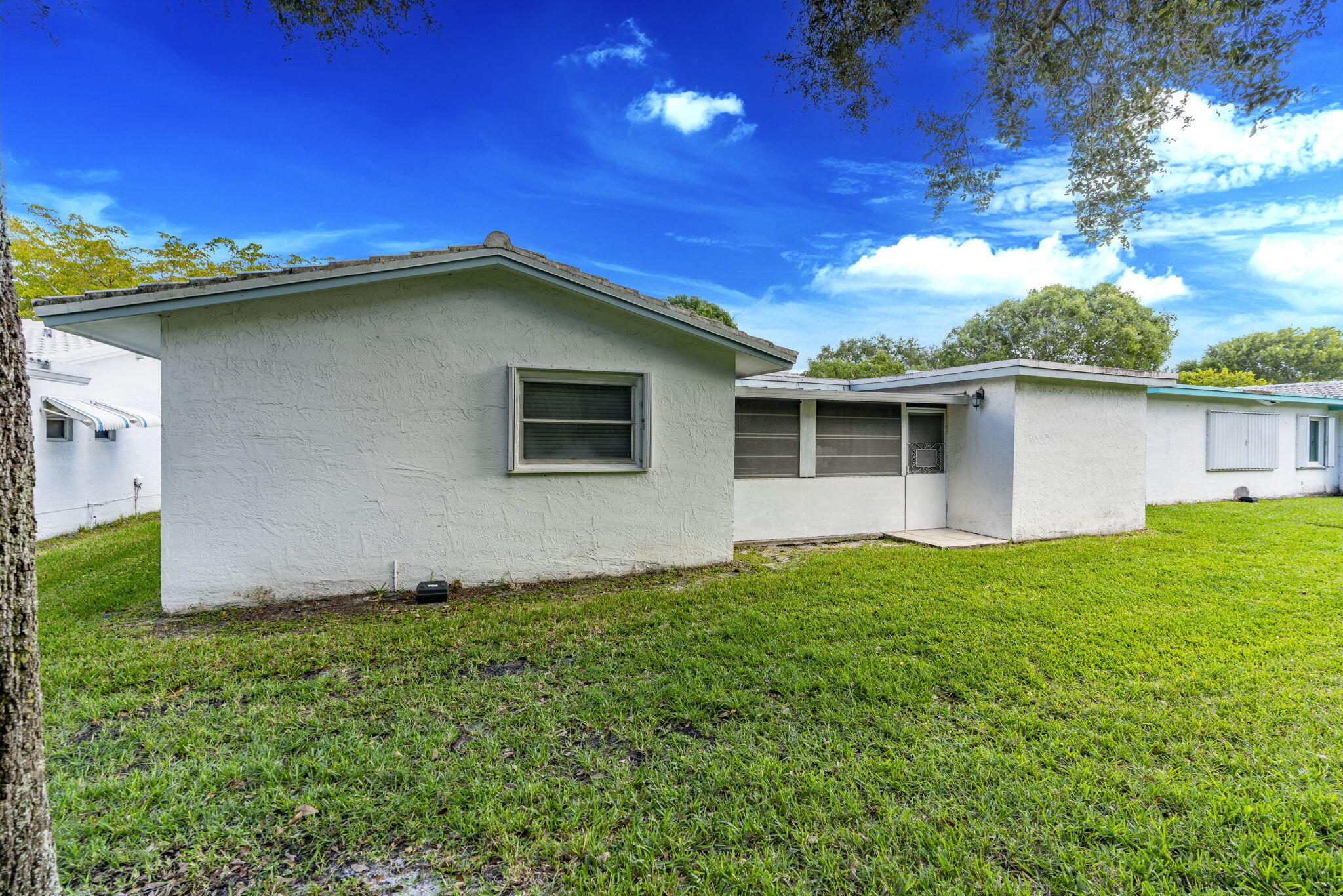 1141 Northwest 90th Way Plantation, FL 33322 - Photo 6 of 75 a view of a house with a yard